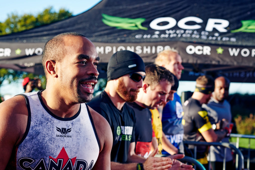 Men at the starting line of an ocr race, racing with integrity. 