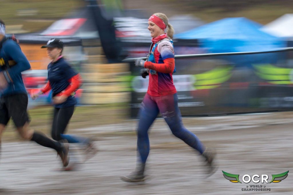 OCR Racer running in the enduro with her racing clothing. 